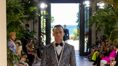 This Alta Sartoria tuxedo jacket arrived collarless and covered in Matrix-style vertical lines of beading