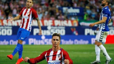 Atletico Madrid's Fernado Torres reacts during the match. (Javier Barbancho/Reuters)