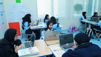 Pupils use the interactive Alef Education platform at Al Asayel School. Courtesy Alef Education