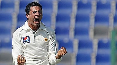 Junaid Khan celebrates the dismissal of danger man Mahela Jayawardene, unseen, at Abu Dhabi.