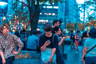 More people are preoccupied on their phones rather than attempting a conversation with a stranger. Jezael Melgoza / Unsplash
