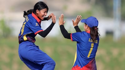 Nepal bowler Krishma Gurung after bowling UAE's Rishitha Rajith for a duck. Gurung finished with figures of 4-17 off her four overs.