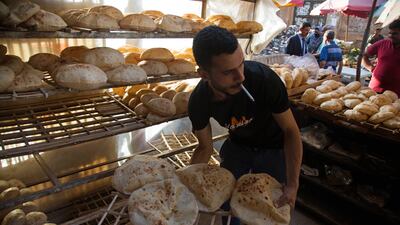 Freshly baked bread at Al-Monira market in Cairo. About 70 million Egyptians rely on heavily subsidised bread. Bloomberg