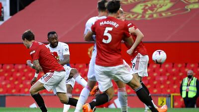 Crystal Palace's Jordan Ayew shoots at goal but his effort is saved by Manchester United goalkeeper David de Gea. PA