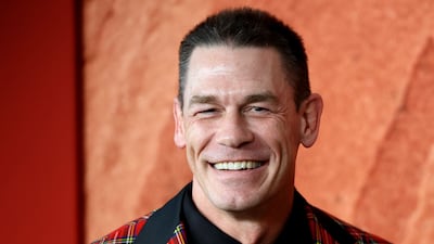 John Cena says he still loves wrestling more than acting, despite retiring from WWE after more than two decades in the ring. AFP
