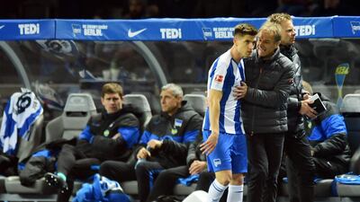 Hertha's former manager Jurgen Klinsmann, right, with Krzysztof Piatek. EPA
