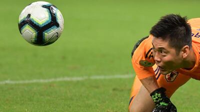 Japan goalkeeper Eiji Kawashima makes a save. AFP