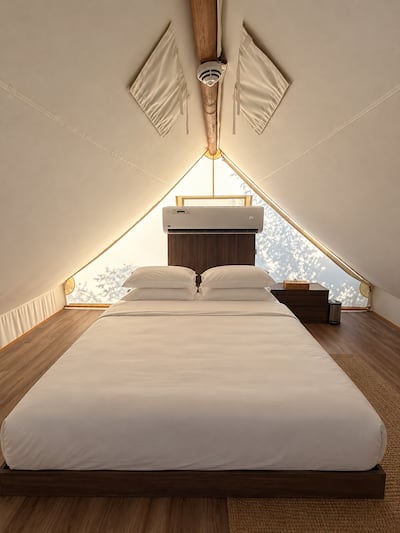 A double bed upstairs in the cabin. Shazia Ahmed / The National