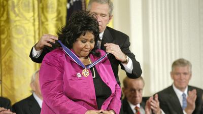 Aretha L. Franklin and President George W. Bush at the Freedom Awards Ceremony at the White House in Washington D.C. on November 9, 2005. Getty Images