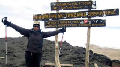 "Congratulations, you are now at Uhuru Peak Tanzania 5,895m. Africa's Highest Point. World's Highest Free-Standing Mountain.