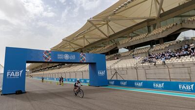 An athlete competes in the 5km time trial during the cycling at the Special Olympics.