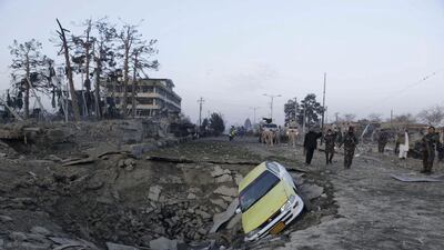 Afghan security forces and Nato troops arrive at the site of an explosion near the German consulate office in Mazar-i-Sharif, Afghanistan November 11, 2016. Anil Usyan / Reuters