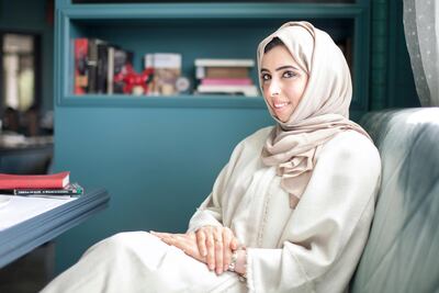 Emirati novelist Shahd Thani volunteers for the Dubai chapter of Book Fairies. Reem Mohammed / The National
