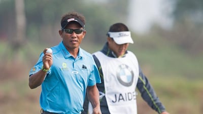 Thongchai Jaidee holds a one-shot lead heading into the final round of the BMW Masters in Shanghai. Johannes Eisele / AFP