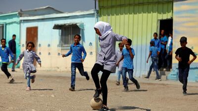 Palestinian students play soccer at their school in Jordan Valley in the Israeli-occupied West Bank. Reuters