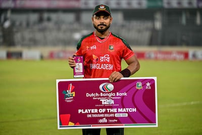 Bangladesh’s Parvez Hossain Emon with the player of the match award. AFP