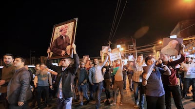 Demonstrators gather in the streets in support of Kurdish president Masoud Barzani. REUTERS/Ari Jalal
