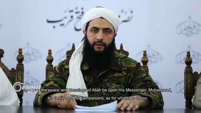 A screengrab of the video in which Jabhat Al Nusra's head, Abu Mohamad Al Jolani, announced that the extremist group was breaking ties with Al Qaeda. Orient News/AFP/Handout