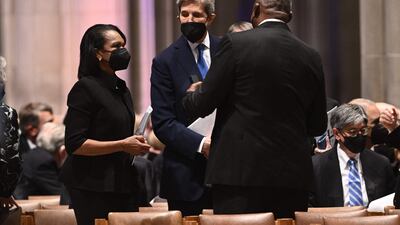 Former secretary of state Condoleezza Rice speaks with US climate envoy John Kerry and Defence Secretary Lloyd Austin. AFP