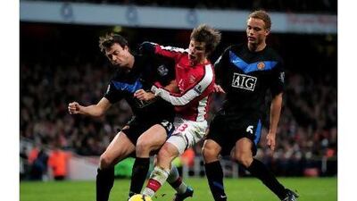 Manchester United beat Arsenal 3-1 away last season thanks to their manager's magic combination - tough tackling and swift counter-attacking. Shaun Botterill / Getty Images