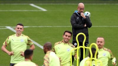 Manchester City manager Pep Guardiola oversees Manchester City training on Monday. PA