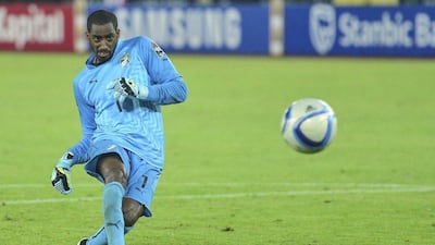 Ivory Coast keeper Boubacar Barry shoots and scores the winning penalty in the 9-8 shootout victory over Ghana on Sunday in the Africa Cup of Nations final in Bata, Equatorial Guinea. Barry Aldworth / EPA