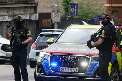 Police outside the Criminal Courts of Justice in Dublin during an earlier appearance by Sean McGovern. AFP