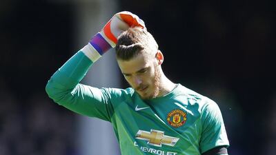Manchester United goalkeeper David de Gea will watch Friday night’s match against Aston Villa from the sideline. Carl Recine / Reuters