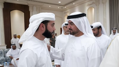 Sheikh Abdullah bin Salem Al Qasimi, Deputy Ruler of Sharjah, right, offers condolences to Dr Sheikh Hazza