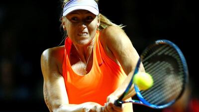 Maria Sharapova returns a shot to Roberta Vinci at the WTA event in Stuttgart, Germany, on April 26, 2017. Ralph Orlowski / Reuters