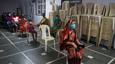 People wait for their turn at a coronavirus testing centre in Mumbai on July 17, 2020. AFP