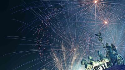 Fireworks illuminate the Quadriga on the Brandenburg Gate during the New Year celebrations in Berlin, Germany. AFP