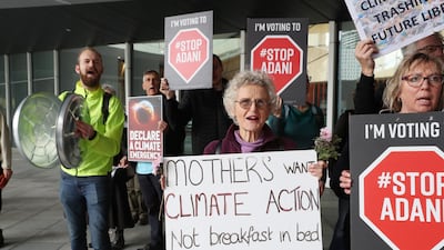 Anti Adani coal mine protesters hold a demonstration outside the Liberal Party campaign launch for the 2019 Federal election at the Melbourne Convention Centre. EPA