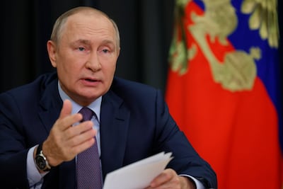 Russian President Vladimir Putin gestures as he attends a meeting on agricultural issues via videoconference in the Bocharov Ruchei residence in the Black Sea resort of Sochi, Russia, Tuesday, Sept. 27, 2022. (Gavriil Grigorov, Sputnik, Kremlin Pool Photo via AP)