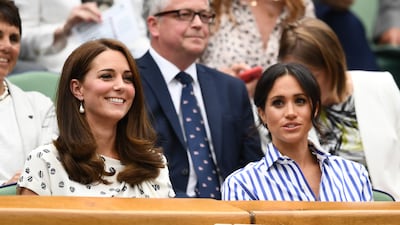 Tennis fans, Kate Middleton and Meghan Markle at Wimbledon in 2018. Getty Images