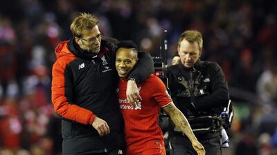 Football Soccer - Liverpool v Manchester City - Barclays Premier League - Anfield - 2/3/16 Liverpool manager Jurgen Klopp celebrates with Nathaniel Clyne at the end of the game Reuters / Phil Noble Livepic EDITORIAL USE ONLY. No use with unauthorized audio, video, data, fixture lists, club/league logos or "live" services. Online in-match use limited to 45 images, no video emulation. No use in betting, games or single club/league/player publications. Please contact your account representative for further details.