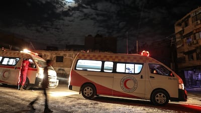 Ambulances wait for patients during the medical evacuations in Douma. Mohammed Badra / EPA