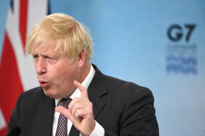 Boris Johnson gestures as he speaks during a news conference on the final day of the Group of Seven leaders summit in England. Bloomberg.