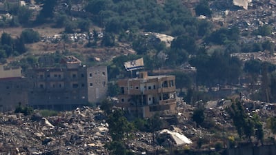 An Israeli flag on the roof of a destroyed house in south Lebanon. EPA