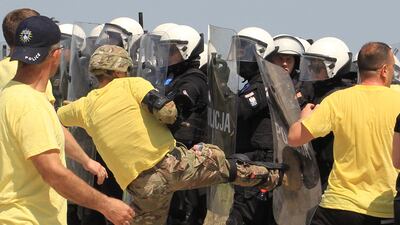 Troops from the Nato-led peacekeeping force and the EU mission in Kosovo take part with local security forces and police in a crowd and riot control drill in Pristina in April 2018. Reuters