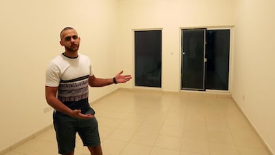 Mohammed Al Shamali, in his new apartment, says his losses as a result of the fire amounted to about Dh35,000. Satish Kumar / The National