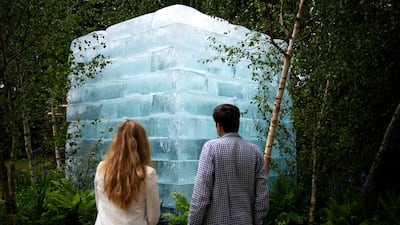 People view The Plantman's Ice Garden at the RHS Chelsea Flower Show in London. PA