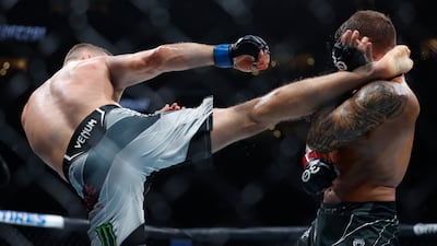 Justin Gaethje throws a kick to the head of Dustin Poirier that ended the fight in Round 2. Reuters