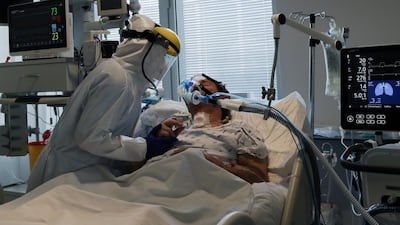 Health staff attends to a patient at the coronavirus disease dedicated ICU unit of the Tras-Os-Montes E Alto Douro Hospital in Vila Real, Portugal. Reuters