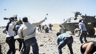 Turkey is facing one of the biggest influxes of refugees from neighbouring Syria since the war there began more than three years ago, according to the United Nations. Bulent Kilic/AFP Photo