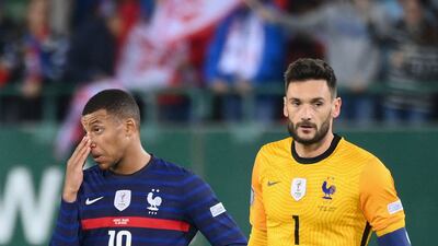 Kylian Mbappe and France goalkeeper Hugo Lloris react after the Nations League draw against Austria. AFP