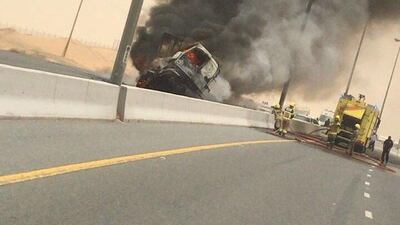 Police are urging drivers to take extra care after a lorry burst into flames after a collision with another vehicle in Sharjah, on July 31, 2018. Courtesy Sharjah Police.