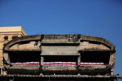 The Lebanese national colours decorate building known as The Egg in downtown Beirut. AFP