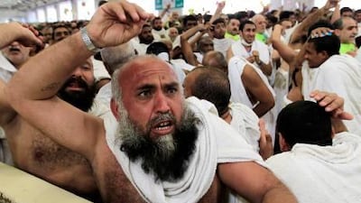 Muslim pilgrims cast stones at a pillar, symbolising the stoning of Satan, in a ritual called the last rite of the annual haj.