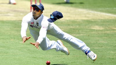 India's Mayank Agarwal drops a catch off the batting of Australia's Mitchell Starc during Day 2 of the fourth Test match at the Gabba in Brisbane, on Saturday, January 16. Reuters
